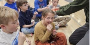Students participating in the "Ag in the Gym" program, learning about dairy, sheep, and swine through hands-on activities funded by the ND FFA Foundation's Ag in the Classroom grant.