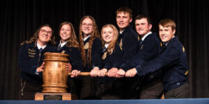 2024-2025 State FFA Officer Team dropping the gavel at the opening session of the 96th Annual State FFA Convention.
